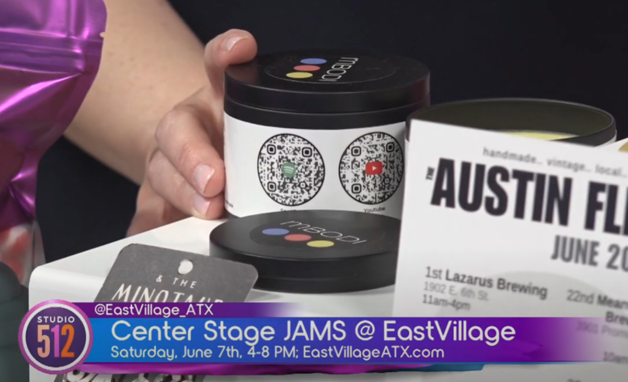 Mbodi candles featured on Studio 512 KXAN local news segment at Austin Flea