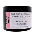 Mbodi 6 oz soy candle ‘Little Wins’ in metal tin with soft toned pink label designed to celebrate small moments of progress and motivation