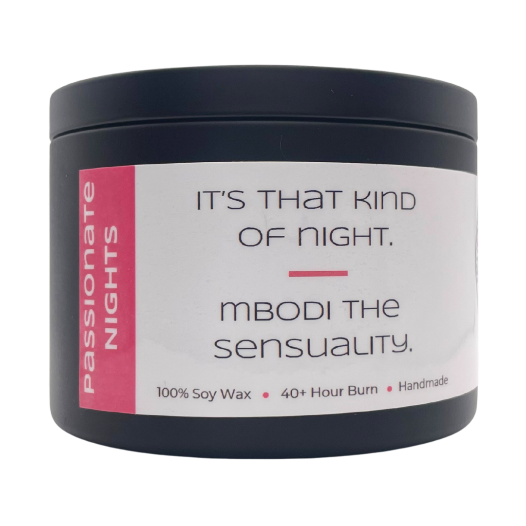 Mbodi 6 oz soy candle ‘Passionate Nights’ in metal tin with pink label designed for a warm, intimate mood