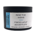 Mbodi 6 oz soy candle ‘Coastal Journey’ in metal tin with minimal beach blue label, crafted for a breezy, open, and restorative environment inspired by the coast