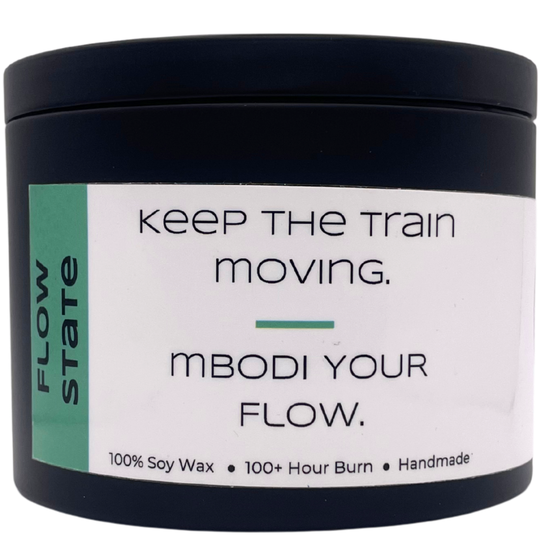 Mbodi 15 oz soy candle ‘Flow State’ in metal tin with minimal peppermint green label, crafted for focused, uninterrupted, and productive energy