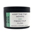 Mbodi 6 oz soy candle ‘Flow State’ in metal tin with minimal peppermint green label, crafted for focused, uninterrupted, and productive energy