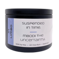 Mbodi 6 oz soy candle ‘In Limbo’ in metal tin with soft toned light blue label designed for a reflective, in between atmosphere