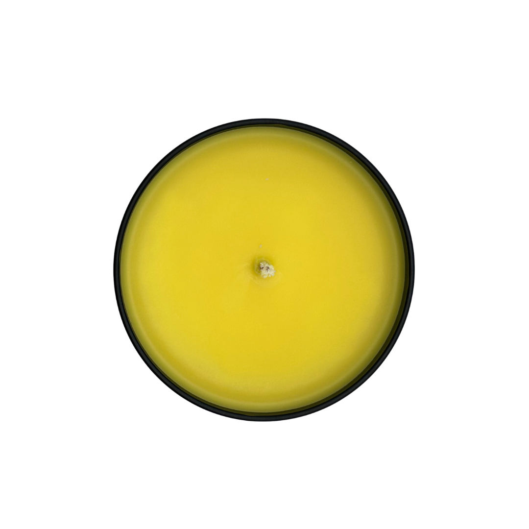 Above shot of yellow Pregame Pulse soy wax candle