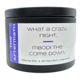 The Aftermath candle with dark purple label with text "What a crazy night. Mbodi the come down".
