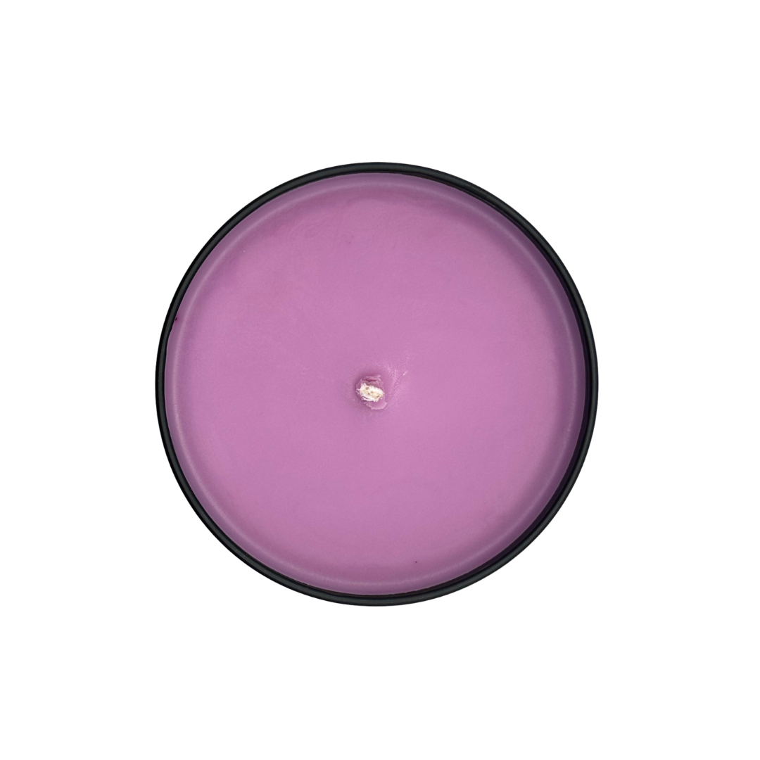 Top photo of Turn Up candle that is Magenta colored