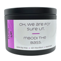 Turn Up candle with orange zest and clementine with text that says "Oh, we are for sure lit. Mbodi the bass".
